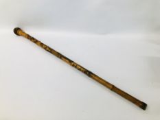 AN ORIENTAL CARVED BAMBOO WALKING CANE DECORATED WITH A ROOSTER PROBABLY JAPANESE C19TH.