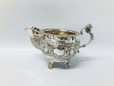 A GEORGE IV SILVER SAUCE BOAT WITH BELLY SPOUT, DUBLIN 1821 L 17.5CM.