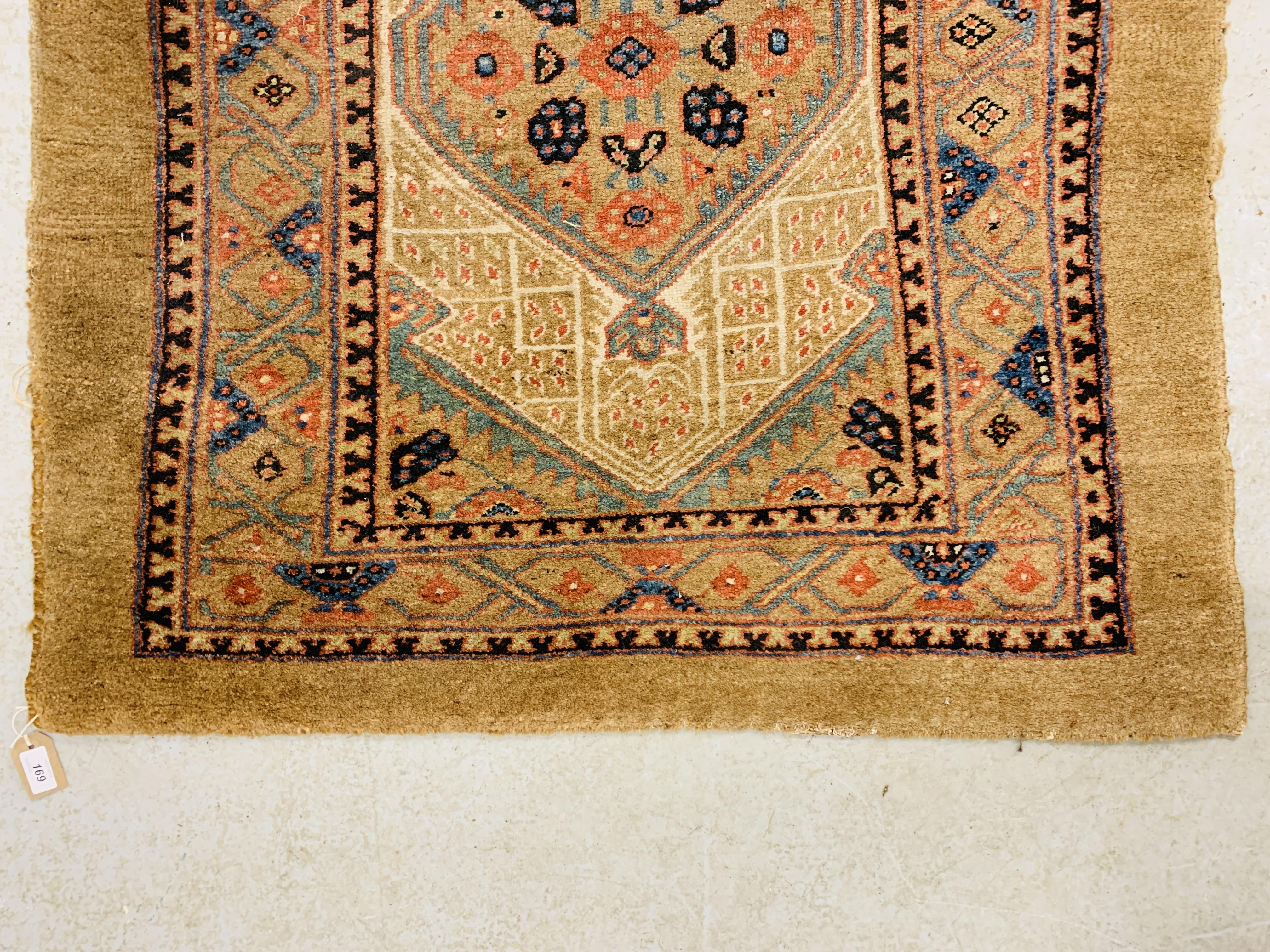 AN UNUSUAL ORIENTAL RUG WITH CENTRAL LOZENGE ON A BROWN FIELD DIVIDED BY A GEOMETRIC DESIGN, - Image 2 of 6