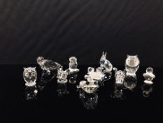A COLLECTION OF TEN SWAROVSKI ANIMALS TO INCLUDE OWLS, ELEPHANT, HARE, DUCK, MOUSE, FROG,