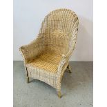 A WICKER HIGH BACK ARMCHAIR