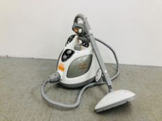 A VAXHOME PRO STEAM AND DETERGENT CARPET CLEANER - SOLD AS SEEN.