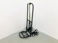 AS NEW FOLDING SACK BARROW FITTED WITH STAIR CLIMBING WHEELS.