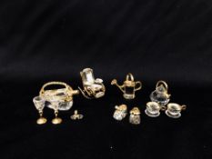 11 X SWAROVSKI CRYSTAL CABINET COLLECTABLES COMPRISING ROCKING CHAIR, WATERING CAN,