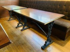 2 X RECTANGULAR BAR TABLES WITH DECORATIVE CAST IRON BASES - TOP 120CM X 61CM.