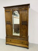 A 1930'S OAK SINGLE DRAWER MIRRORED DOOR WARDROBE