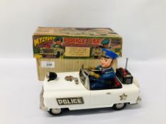 VINTAGE TIN PLATE BATTERY POWERED MYSTERY POLICE CAR