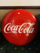 A LARGE REPRODUCTION COCA COLA ADVERTISING SIGN - DIAMETER 90CM.