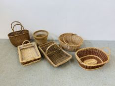 6 WICKER BASKETS OF VARYING SHAPES AND DESIGNS.