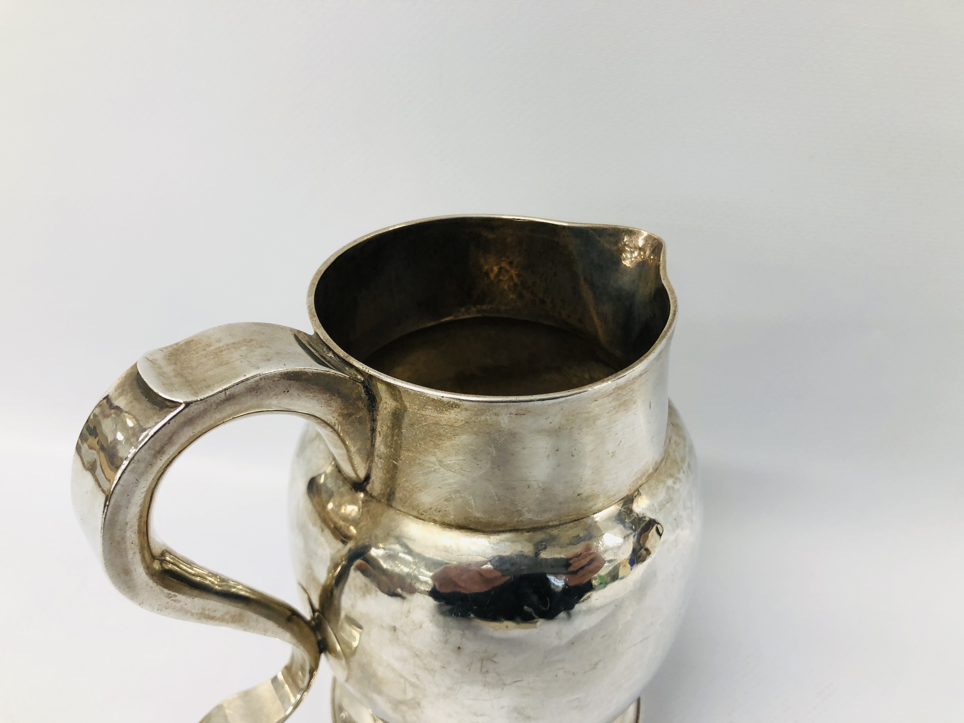 A GEORGE III SILVER JUG, THE 'S' SHAPED HANDLE ON A PLAIN BULBOUS BODY, NEWCASTLE 1790, J. - Image 8 of 21