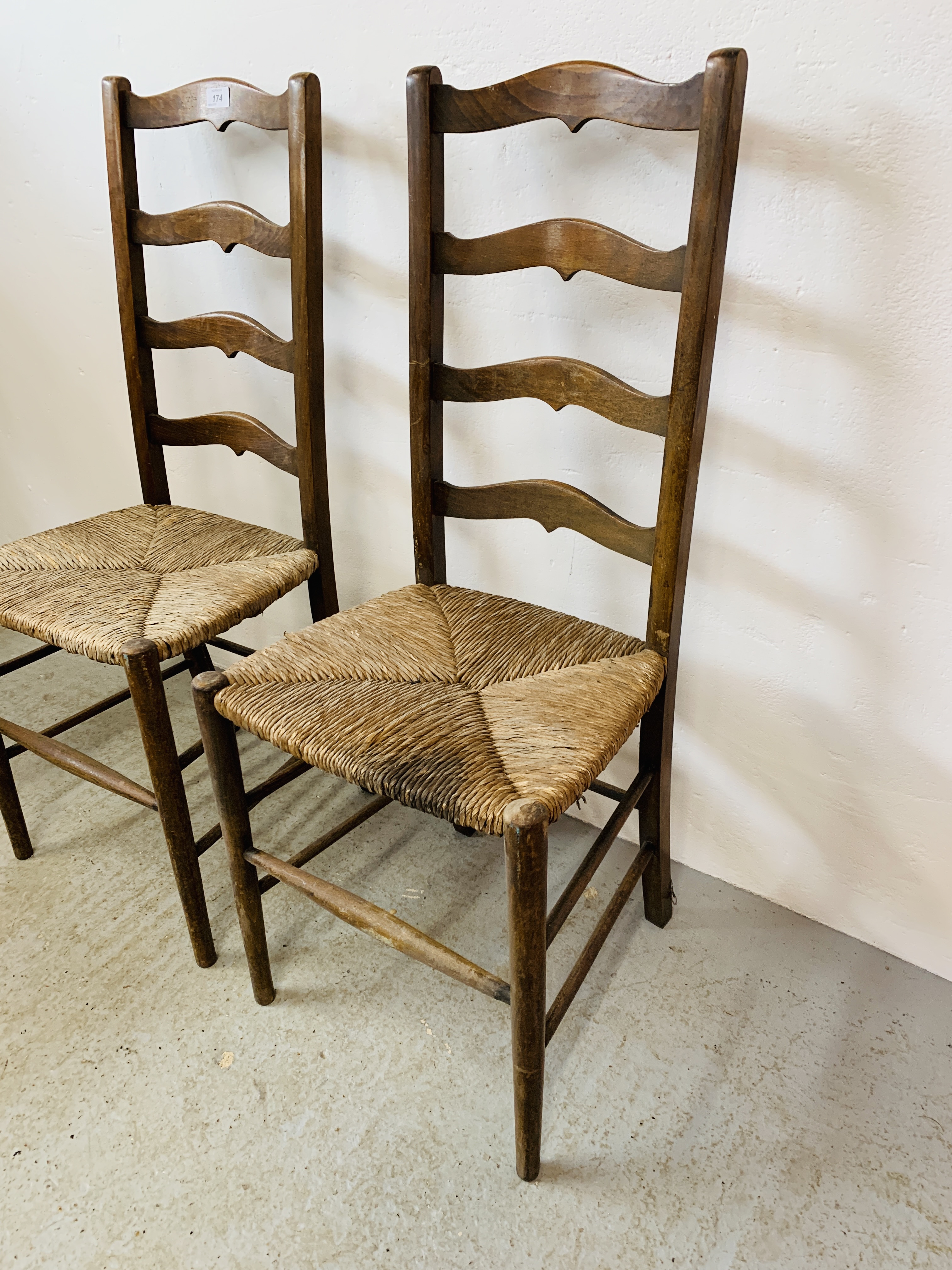 A PAIR OF ANTIQUE OAK LADDER BACK RUSH SEATED CHAIRS - Image 2 of 8