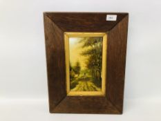 AN OAK FRAMED OIL ON PANEL DEPICTING A SHEPHERD WITH SHEEP ON COUNTRY LANE - 14 X 25CM BEARING