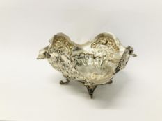 A DUTCH SILVER SWEET MEAT BOWL WITH WAVY RIM DECORATED WITH FLOWERS AND BIRDS IN ROCOCO STYLE ON