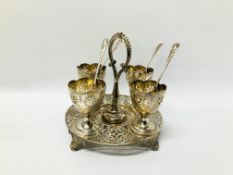 VICTORIAN SILVER STAND WITH FOUR EGG CUPS SHEFFIELD 1872, SPOONS LATER.