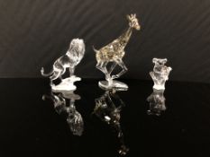 A COLLECTION OF THREE SWAROVSKI ANIMAL FIGURES TO INCLUDE KOALA HUGGING YOUNG IN V OF A TREE,