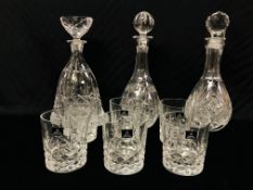 NINE PIECES OF ROYAL DOULTON LEAD CRYSTAL GLASSWARE TO INCLUDE THREE DECANTERS HEIGHT 31CM AND SET