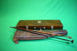 A VINTAGE LEATHER LEG OF MUTTON GUN CASE FOR RESTORATION AND A BRASS BOUND WOODEN MOTORING CASE