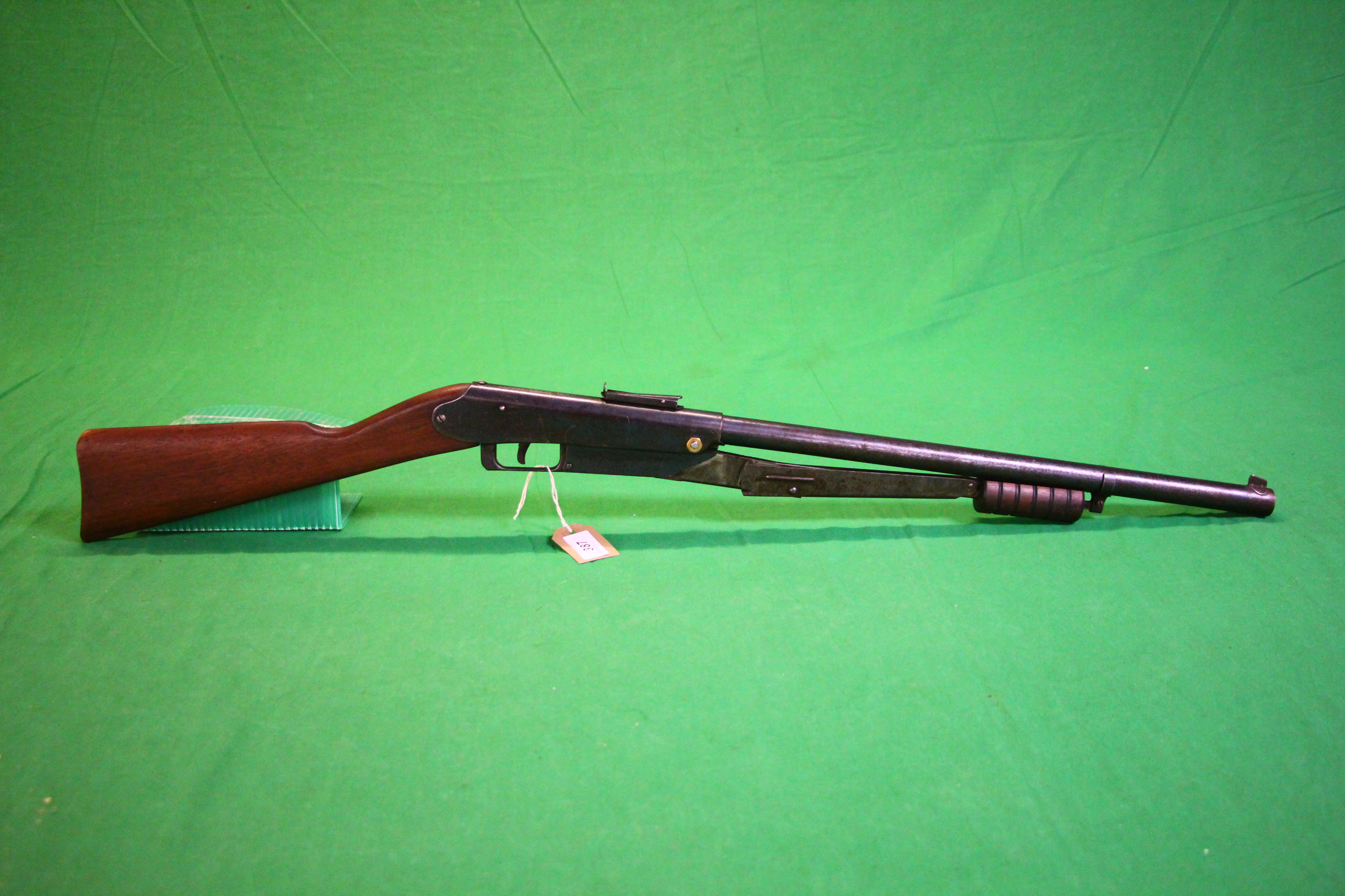 A DAISY MODEL 25 PUMP ACTION AIR GUN - (ALL GUNS TO BE INSPECTED AND SERVICED BY QUALIFIED GUNSMITH