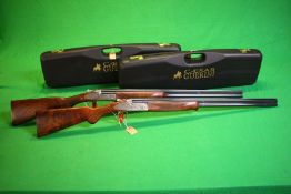 A MATCHED PAIR OF 20 BORE CAESAR GUERINI MAXUM SHOTGUNS PRESENTED IN THEIR TRANSIT CASES COMPLETE