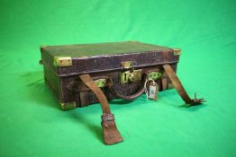 A LEATHER CARTRIDGE BOX WITH BRASS FIXINGS CONTAINING WOODEN LINING AND LABEL BEARING WATSON BROS