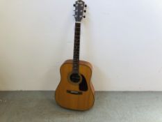 A FENDER ACOUSTIC GUITAR