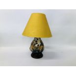A MOORCROFT TABLE LAMP BRAMBLE PATTERN WITH YELLOW SHADE - OVERALL HEIGHT 40CM.