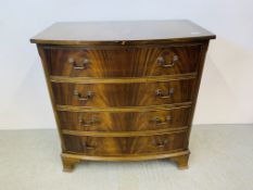 A REPRODUCTION MAHOGANY FINISH FOUR DRAWER BOW FRONTED CHEST ON BRACKET FEET - W 88CM. D 51CM.