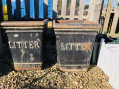 A PAIR OF HEAVY CAST IRON "LITTER" BINS / PLANTERS - HEIGHT 58CM.