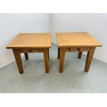 A PAIR OF SOLID LIGHT OAK SINGLE DRAWER LAMP TABLES EACH W 61CM. D 56CM. H 57CM.