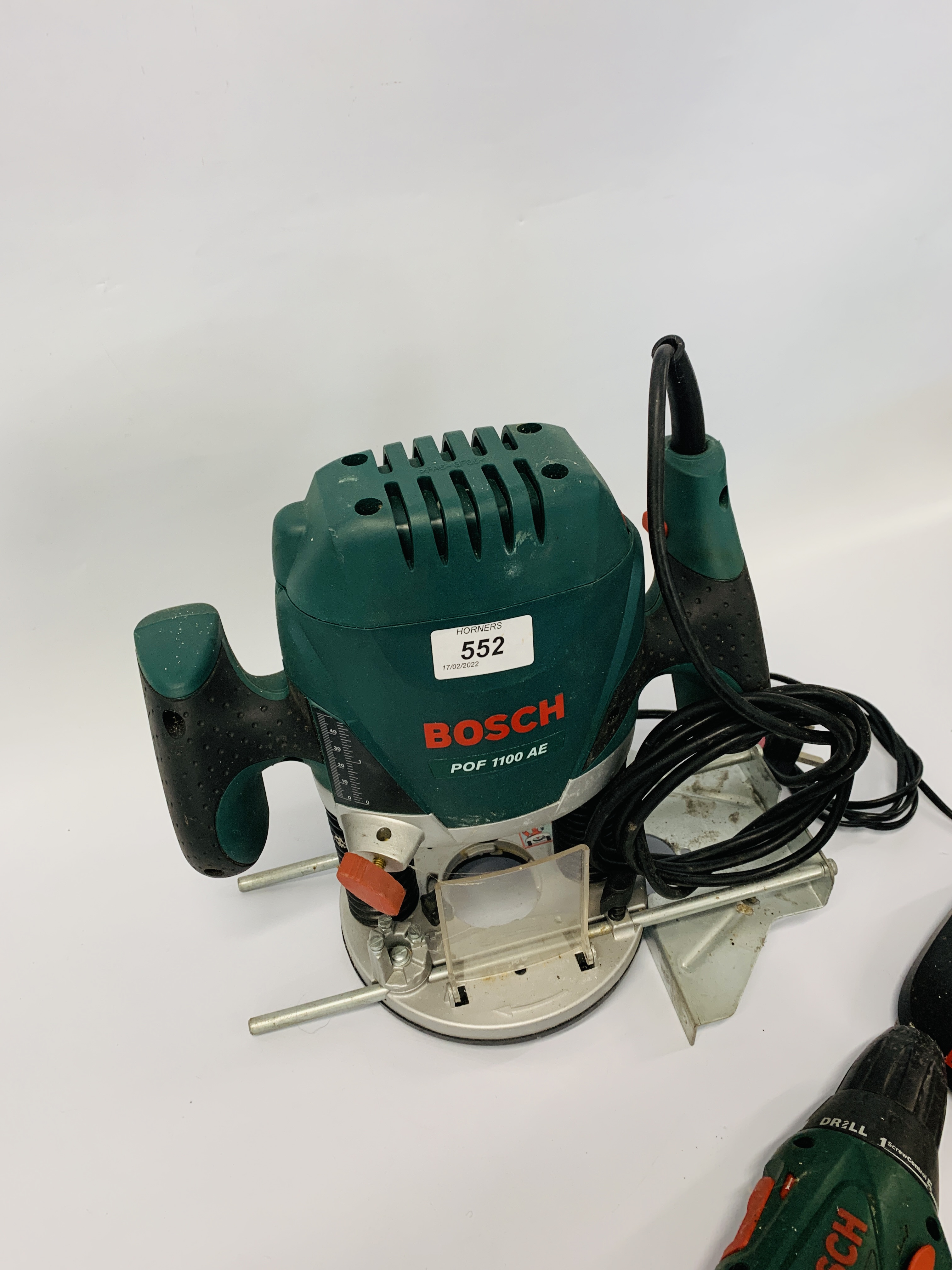 A BOSCH PLUNGE ROUTER MODEL POF 1100 AE AND A BOSCH 18 VOLT CORDLESS DRILL AND CHARGER MODEL PSR18 - Image 6 of 6