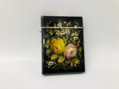 A PAPIER MACHE BLACK LACQUERED AND FINELY PAINTED CARD CASE