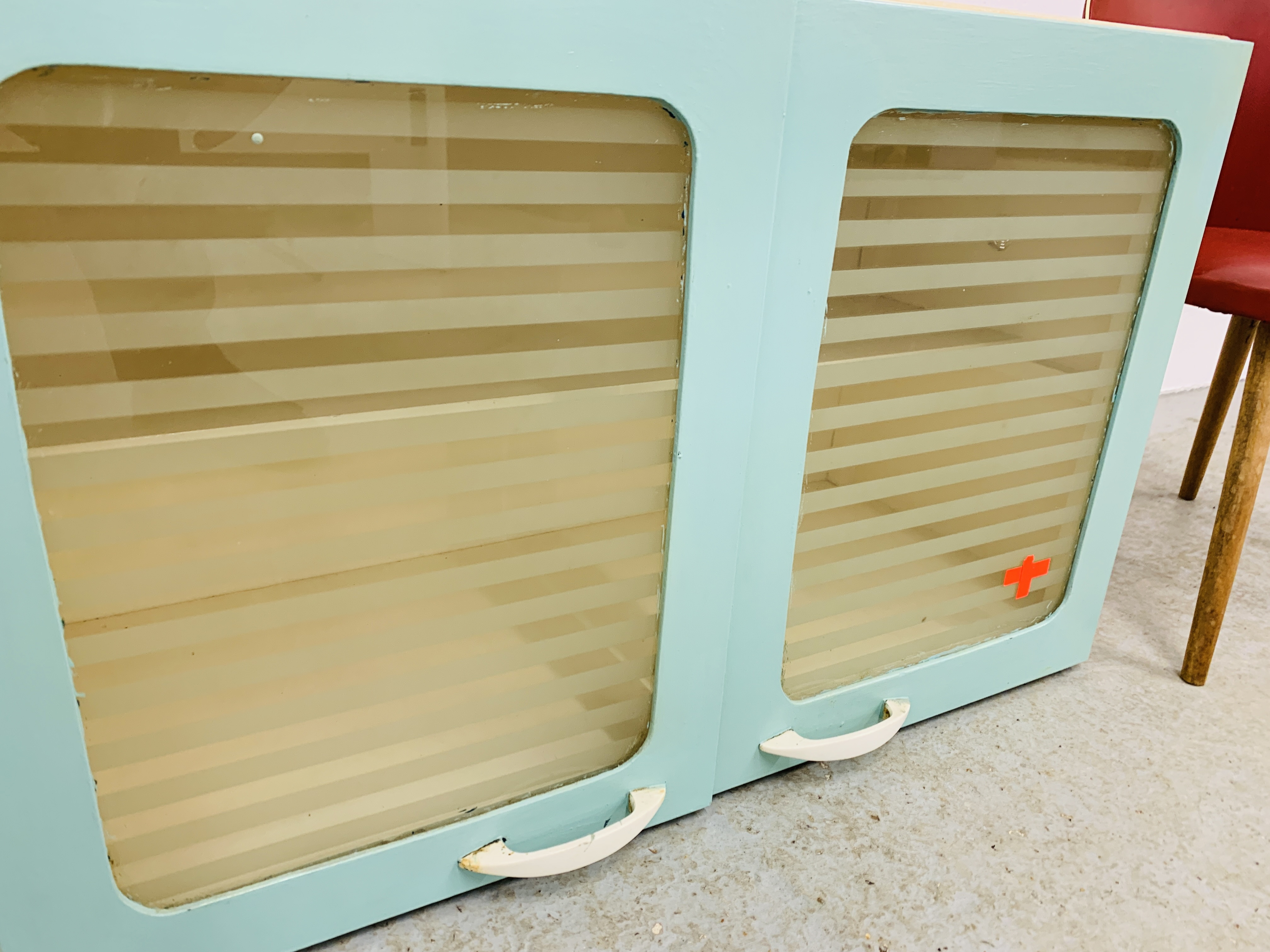 A 1940'S 2 DOOR KITCHEN CABINET ALONG WITH 1940'S RED CHILD'S CHAIR - Image 4 of 5