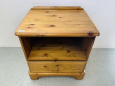 A DUCAL HONEY PINE SINGLE DRAWER BEDSIDE STAND - W 58CM. D 45CM. H 61CM.