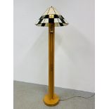 A MODERN DESIGNER LIGHT OAK FOUR COLUMN LAMP STANDARD WITH TIFFANY STYLE LEADED GLASS SHADE - SOLD