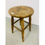 A VINTAGE OAK SEATED STOOL