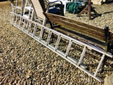 A TWELVE TREAD ALUMINIUM DOUBLE EXTENSION LADDER ALONG WITH TWO SETS FOLDING HOUSEHOLD STEPS
