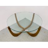 A VINTAGE G PLAN STYLE CIRCULAR GLASS TOP COFFEE TABLE - DIAMETER 76CM.