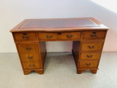 A REPRODUCTION TWIN PEDESTAL HOME OFFICE DESK WITH BURGUNDY TOOLED LEATHER INSERT TO TOP