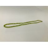A PERIDOT FINE NECKLACE ON 9CT CLASP CHAIN