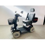 A ROAD LEGAL SHOPRIDER DELUXE MOBILITY SCOOTER COMPLETE WITH CHARGER,