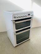 A HOTPOINT ULTIMA ELECTRIC DOUBLE OVEN SLOT IN COOKER WITH CERAMIC HOB - SOLD AS SEEN (TO BE FITTED