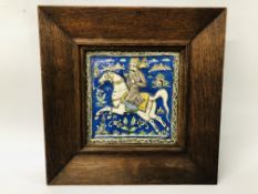 A C19TH QAJAR TILE OF A MOUNTED FIGURE 21 X 21CM.
