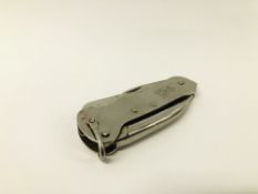 MILITARY POCKET TOOL DATED 1952