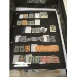 CHINA: FILE BOX WITH AN ACCUMULATION ON LEAVES, STOCKCARDS AND LOOSE, POSTAGE DUES, TAIWAN, ETC.