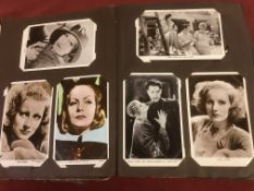 OLD ALBUM WITH A COLLECTION CINEMA STAR POSTCARDS, GRETA GARBO, DOUGLAS FAIRBANKS, ROBERT TAYLOR,