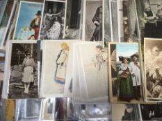 A COLLECTION OF ETHNIC RELATED POSTCARDS (APPROX 105)
