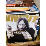 A QUANTITY OF VARIOUS BEATLES BOOKS, THE BEATLES MONTHLY BOOK, ETC.