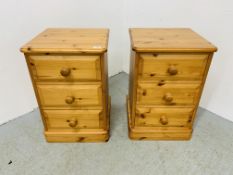 A PAIR OF GOOD QUALITY SOLID HONEY PINE THREE DRAWER BEDSIDE CABINETS.