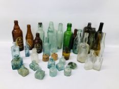 34 VARIOUS VINTAGE GLASS BOTTLES SOME OF LOCAL INTEREST