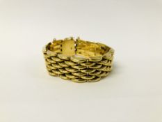 A HEAVY MULTI LINK BRACELET MARKED 18K